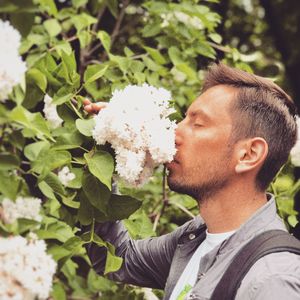 Portrait of man with plants