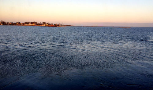 Scenic view of sea at sunset