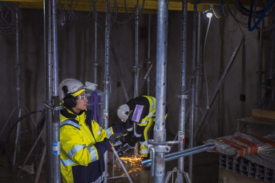 Engineer at building site using digital tablet