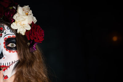 Close-up of rose against black background