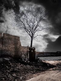 Old building against cloudy sky