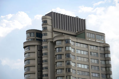 Low angle view of modern building against sky