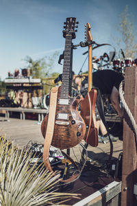 People playing guitar at music concert