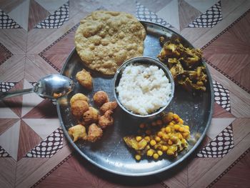 High angle view of food served on table