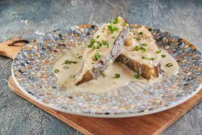 Halibut fish with muscat wine sauce. french gourmet cuisine