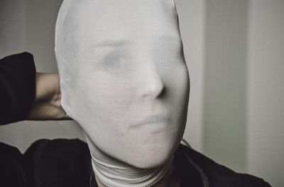 Close-up of man covering face