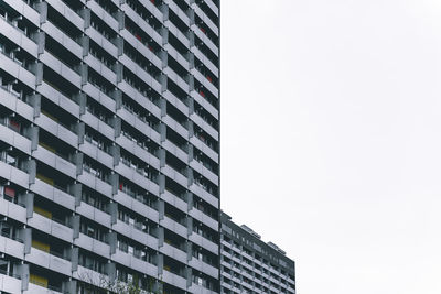 Low angle view of modern building against clear sky