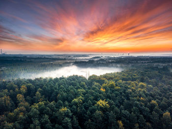 Scenic view of dramatic sky during sunset