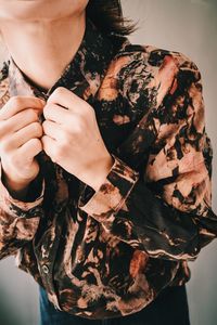 Midsection of woman holding ice cream