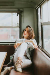 Woman sitting in bus