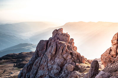 Panoramic view of rock formations against sky