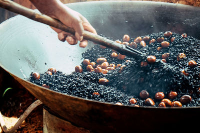 Close-up of person preparing food