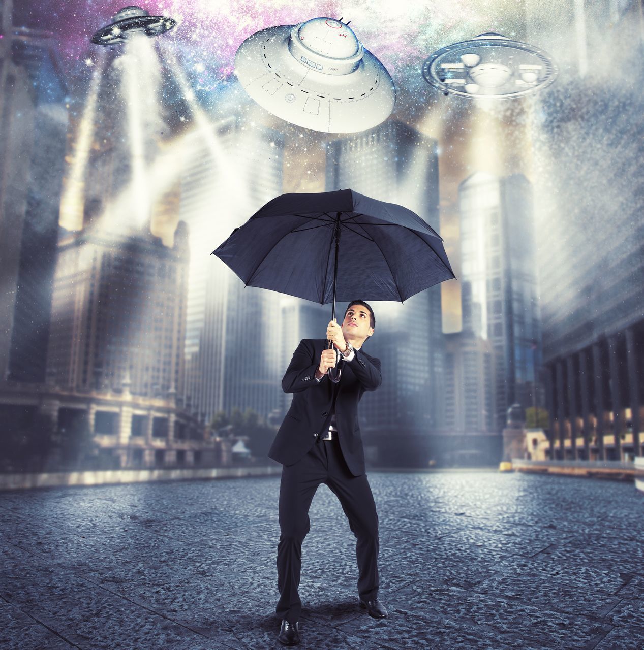 FULL LENGTH OF A WOMAN STANDING WITH UMBRELLA