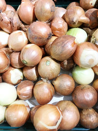 Full frame shot of onions for sale at market stall