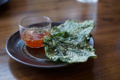 Close-up of drink served on table