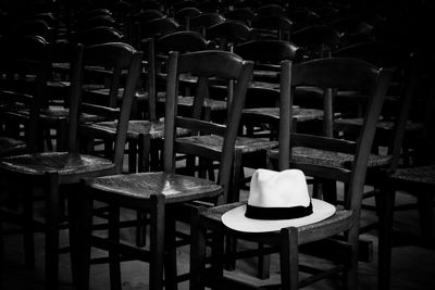 Empty chairs and tables in cafe