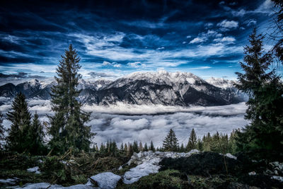 Scenic view of mountains against sky during winter