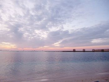 Scenic view of sea against sky at sunset
