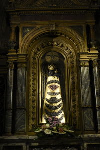 Low angle view of buddha statue in building