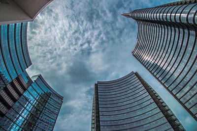 Low angle view of modern buildings against sky