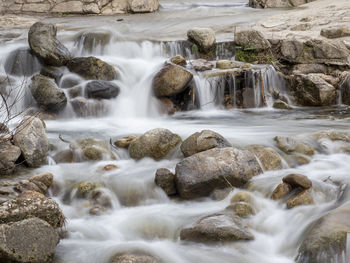 Scenic view of waterfall in forest