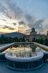 View of building in city during sunset