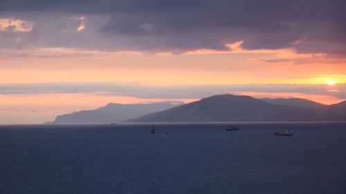 Scenic view of sea at sunset