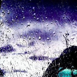 Close-up of water drops on glass