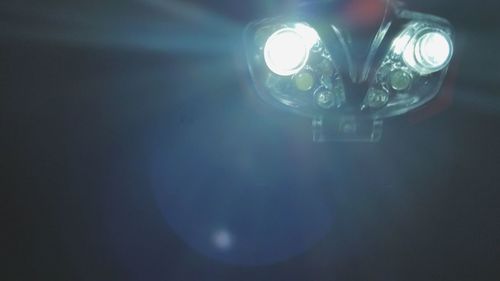 Low angle view of illuminated light bulb