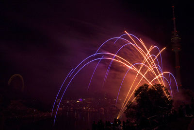 Firework festival at the olympiapark muenchen, munich, germany - red/pruple bows