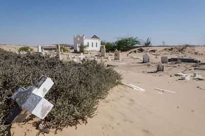 Panoramic view of beach against clear sky