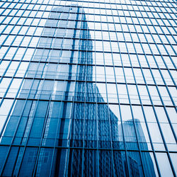 Low angle view of modern glass building