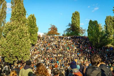 Spectators sitting in stadium