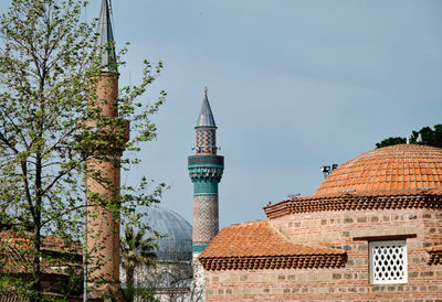 Low angle view of buildings against sky in city