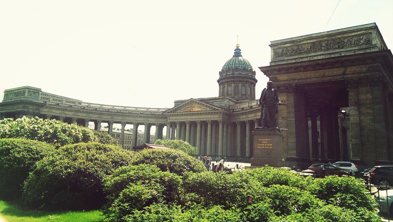 architecture, built structure, building exterior, clear sky, tree, famous place, low angle view, travel destinations, religion, travel, history, green color, tourism, place of worship, copy space, international landmark, day, city, spirituality, outdoors