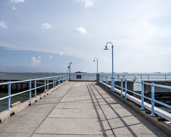 Pier over sea against sky