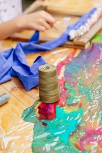 Close-up of human hand on table