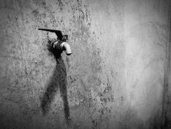 Full length of young man on wall