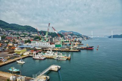 Panoramic view of harbor against sky