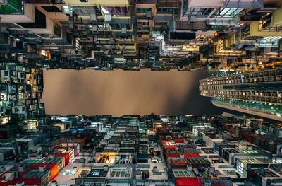 Aerial view of illuminated buildings in city