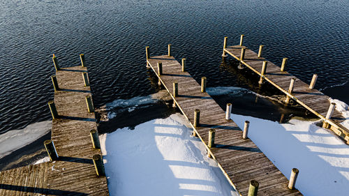 Snow and ice formed on the waters edge at the boat landing