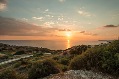 Scenic view of sunset over sea