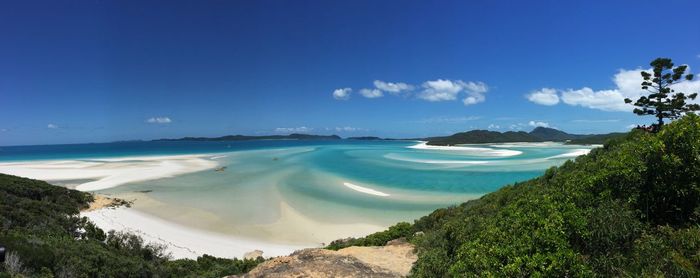 View of beach against blue sky