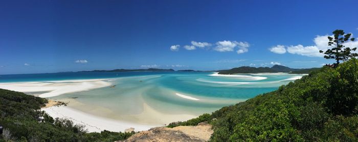 View of beach against blue sky