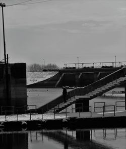 Bridge over river against sky