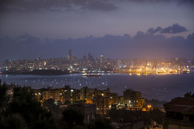 Aerial view of illuminated cityscape at night