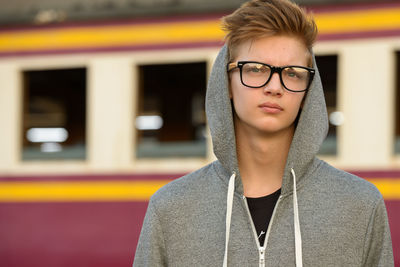 Portrait of young man wearing eyeglasses