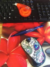 Close-up of red object on table