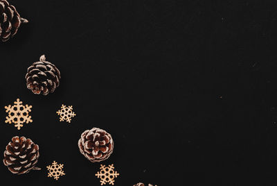 High angle view of christmas decoration on table against black background