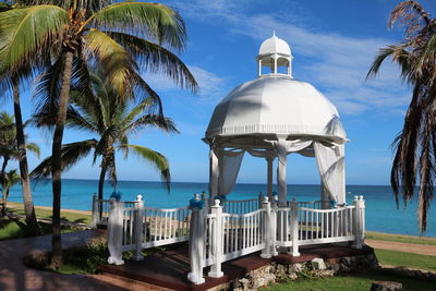 Scenic view of building by sea